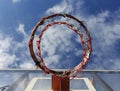 Basketball hoop on blue sky and clouds Royalty Free Stock Photo