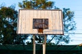 Basketball hoop on blue wood and white iron structure base