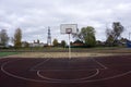 Basketball hoop cage, isolated large backboard closeup, new outdoor court set, green, red, orange, white back board blank copy spa