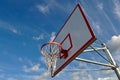 Basketball Hoop with Clouds and Blue Sky Royalty Free Stock Photo