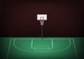 Basketball hoop on empty green court Royalty Free Stock Photo