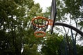 A basketball hoop in the middle of a park Royalty Free Stock Photo