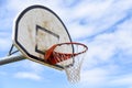 Basketball hoop with net on an outdoor basketball court Royalty Free Stock Photo