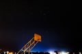 Basketball hoop with Night scene and bright stars with blue and purple light Royalty Free Stock Photo