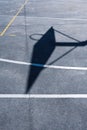 Basketball hoop shadow on the ground, sports equipment Royalty Free Stock Photo