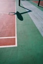 Basketball hoop shadow silhouette on the court on the street Royalty Free Stock Photo