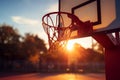 Basketball hoop shines in the sun, a focal point in sports