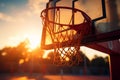 Basketball hoop shines in the sun, a focal point in sports