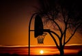 Basketball hoop at sunset. AI Generated