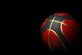 Basketball isolated on black background with red, black and gold colors Royalty Free Stock Photo
