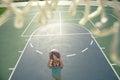 Basketball kids game. Cute little child boy holding a basket ball trying make a score. Royalty Free Stock Photo