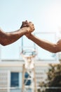 Basketball men handshake before game at sport court for good luck, agreement and support. Sports, fitness and athletes Royalty Free Stock Photo