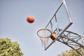 Basketball net, ball and outdoor sports goals, competition game and action on sky background. Background basketball Royalty Free Stock Photo