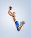 Basketball player in action isolated on white Royalty Free Stock Photo