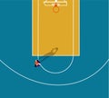 Basketball player with ball in colorful court. Top view arena. Royalty Free Stock Photo