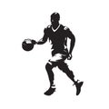 Basketball player dribbles with the ball and running
