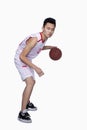 Basketball Player Dribbling, Studio Shot Royalty Free Stock Photo