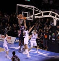 Basketball player dunking ball Royalty Free Stock Photo