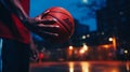 Basketball Player Holding the Ball in Urban Night Lights. Generative ai Royalty Free Stock Photo
