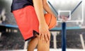 Basketball player with injured knee
