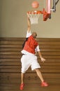 Basketball Player Misses Slam Dunk