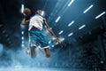 Basketball player on big professional arena during the game. Basketball player making slam dunk. Royalty Free Stock Photo