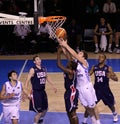 Basketball player rebounding Royalty Free Stock Photo