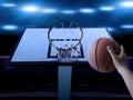 Basketball Player scoring an athletic, amazing slam dunk in a professional basketball game Royalty Free Stock Photo