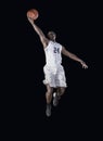 Basketball Player scoring a basket Royalty Free Stock Photo