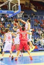 Basketball players Olympiakos (Greece, in red)