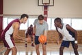 Basketball players ready for the jump ball Royalty Free Stock Photo