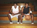 Basketball Players Sitting On Bench