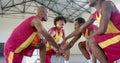 Basketball players strategize during a timeout