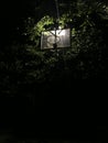 Basketball ring at night in the light of a lantern. Outdoor basketball court Royalty Free Stock Photo