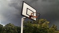 Basketball Ring With Stormy Sky