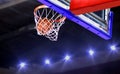 Basketball shot to the hoop with bright spotlights Royalty Free Stock Photo