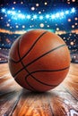 A basketball is sitting on a wooden floor in front of a basketball court Royalty Free Stock Photo