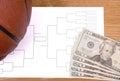 March Madness Basketball Bracket and Fanned Money Royalty Free Stock Photo