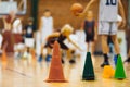 Basketball training equipment on wooden practice court. Basketball Dribble Training Cones Royalty Free Stock Photo