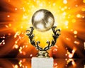 Basketball trophy against shiny background Royalty Free Stock Photo