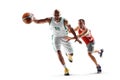 Basketball. Two basketball player in motion and action. Sport emotion. Isolated in white. Royalty Free Stock Photo