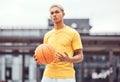 Basketball, young man and basketball player with sport in park with portrait in city and exercise outdoor. Fitness