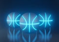 Basketballs with futuristic blue glowing neon lights on a dark background with copy space in a conceptual image