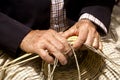 Basketry craftsman hands working Royalty Free Stock Photo