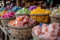 Baskets of colorful soaps sold at market
