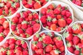 Strawberries boxes baskets texture in outdoor market Royalty Free Stock Photo