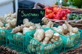 Baskets of freshly harvested jerusalem artichokes, sunchokes, for sale at a farmers market Royalty Free Stock Photo
