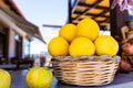 Baskets full of beautiful oranges for sale at the farmer's market on a bright, sunny morning. Royalty Free Stock Photo
