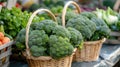 Baskets of green broccoli for sale at a farmer\'s market Royalty Free Stock Photo