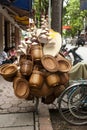 Baskets and hats overloading bicycle in Bangkok, Thailand